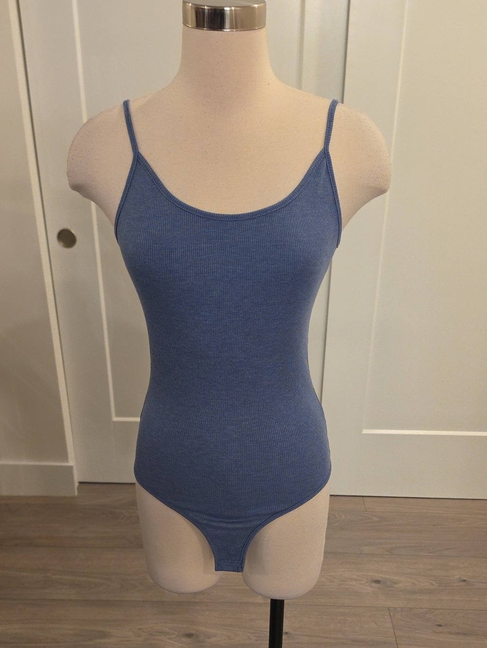 Timing Blue Ribbed thin adjustable Strap Bodysuit. Size large Good condition